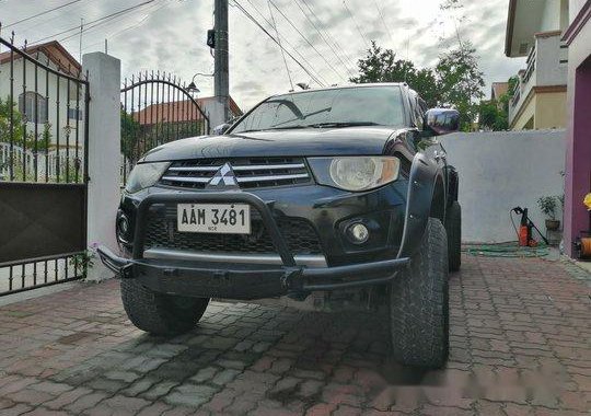 Sell Black 2012 Mitsubishi Strada in Bamban