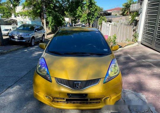 Yellow Honda Jazz 2010 for sale in Manila