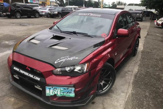 Red Mitsubishi Lancer 2010 for sale in Manila