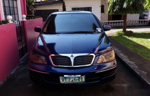 Selling Blue Mitsubishi Lancer 2004 Hatchback in Manila