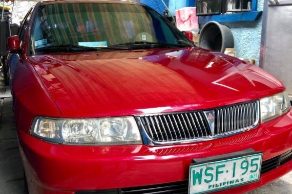 Red Mitsubishi Lancer 2001 for sale in Quezon City