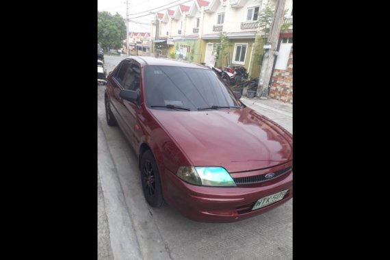 Sell Red 2001 Ford Lynx Sedan in Mabalacat