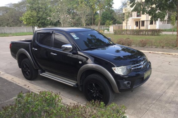 Black Mitsubishi Strada 2013 Truck for sale in Lumban