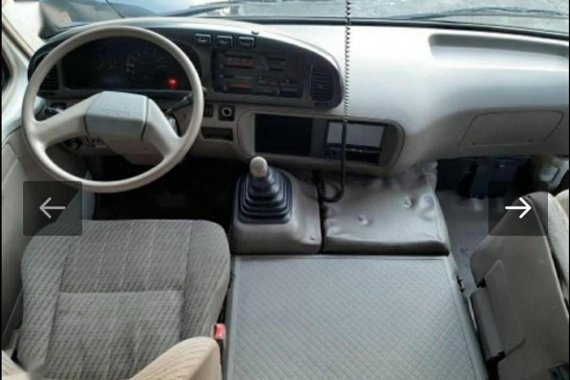 White Toyota Coaster 1998 for sale in Manila