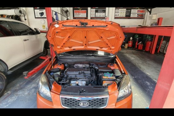 Selling Orange Kia Rio 2010 Sedan in Manila