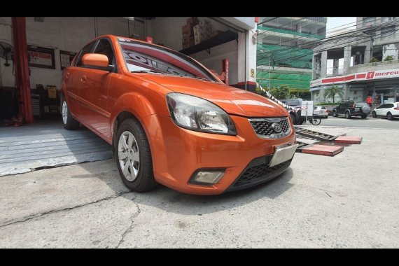 Selling Orange Kia Rio 2010 Sedan in Manila