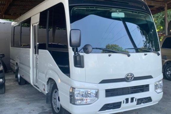 White Toyota Coaster for sale in Manila