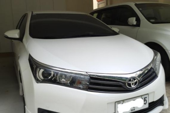 Pearl White Toyota Corolla altis for sale in Manila