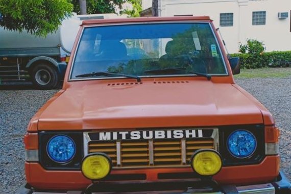 Selling Orange Mitsubishi Pajero for sale in Bustos