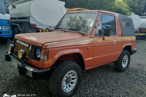 Selling Orange Mitsubishi Pajero for sale in Bustos