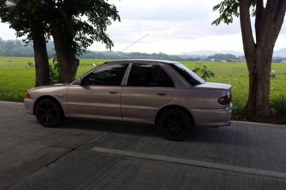 Selling Beige Mitsubishi Lancer for sale in Rizal