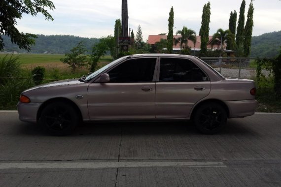 Selling Beige Mitsubishi Lancer for sale in Rizal