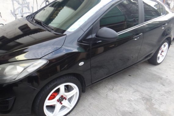 Selling Black Mazda 2 for sale in Manila