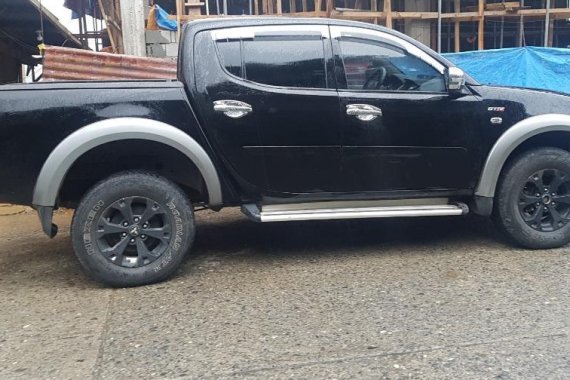 Black Mitsubishi Strada 2013 for sale in Baguio City