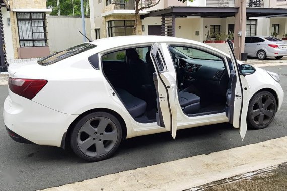 Sell White Kia Rio in Quezon City