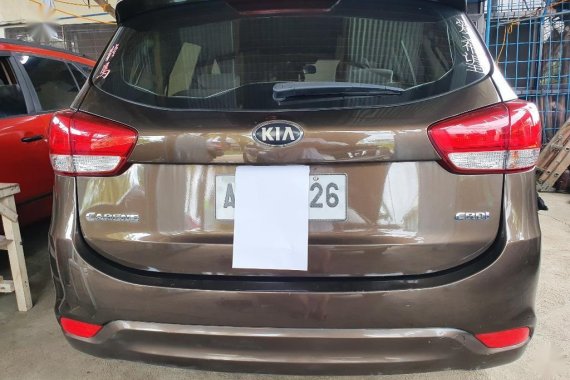 Brown Kia Carens for sale in Butuan
