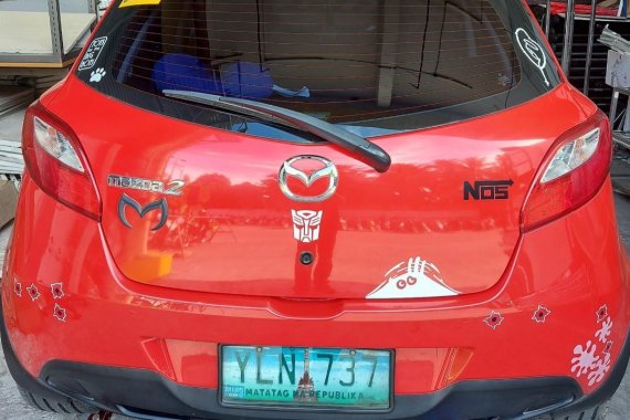 Selling Red Mazda 2 in Manila