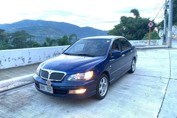 Selling Blue Mitsubishi Lancer for sale in Manila