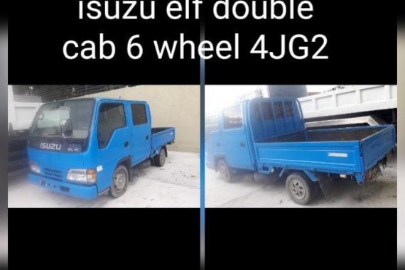 Blue Isuzu Elf for sale in Manila