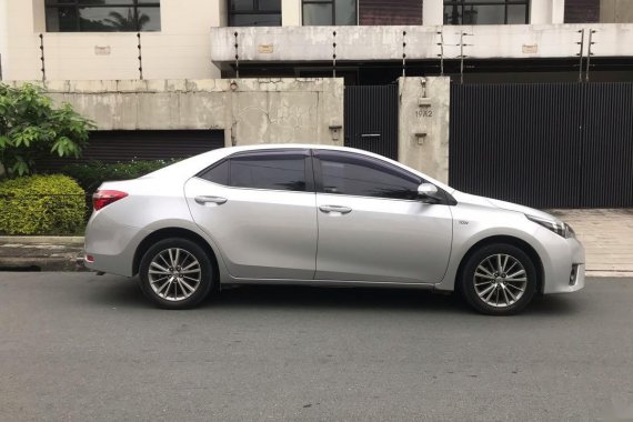 White Toyota Corolla altis for sale in Quezon City