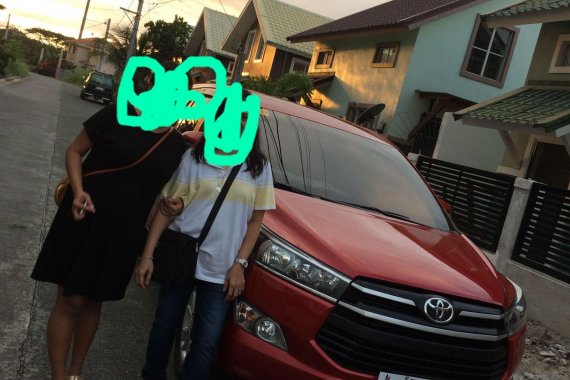 Selling Red Toyota Innova in Manila