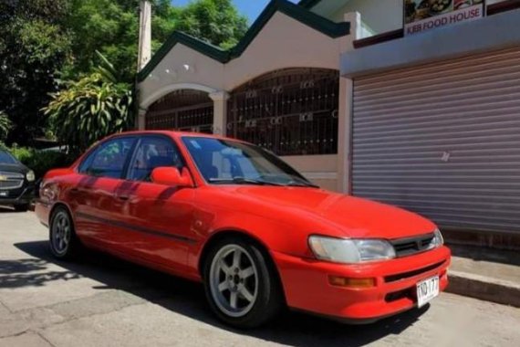 Selling Red Toyota Corolla in Quezon City
