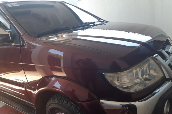 Dark Red Isuzu Sportivo 2012 at a good price for sale in Tagum