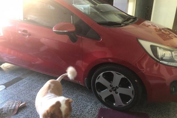 Selling Red Kia Rio in Angeles