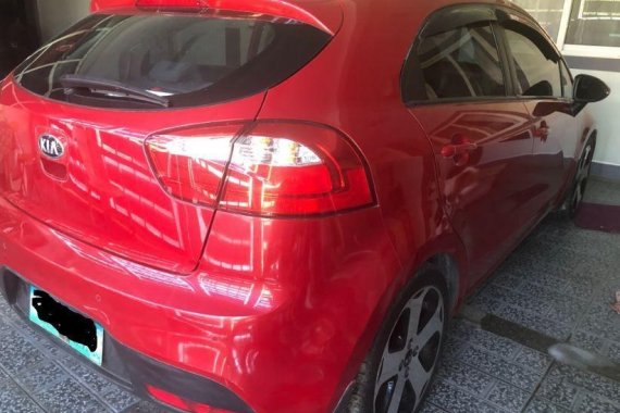 Selling Red Kia Rio in Angeles