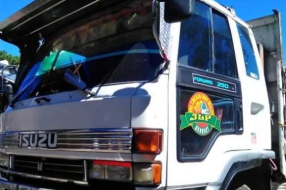 White Isuzu Elf for sale in La Trinidad