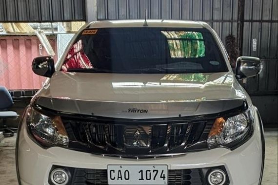 Sell White 2018 Mitsubishi Strada in General Trias