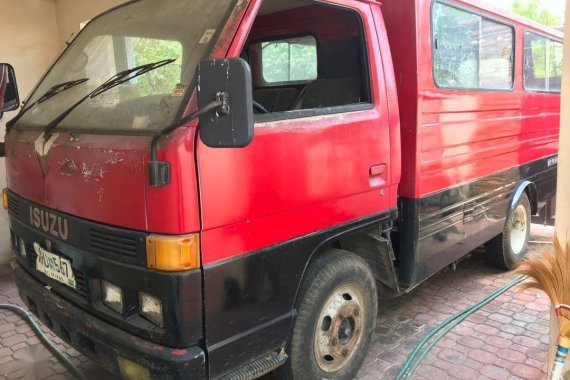 Red Isuzu Elf for sale in Manila