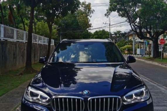 Selling Black Bmw X5 in Quezon City