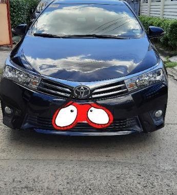 Sell Black 2014 Toyota Corolla in Bauan