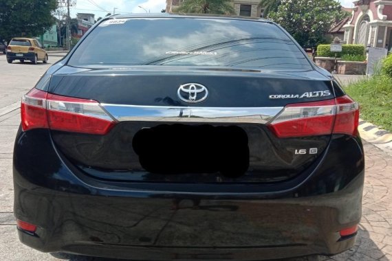 Sell Black 2015 Toyota Corolla Altis in Quezon City