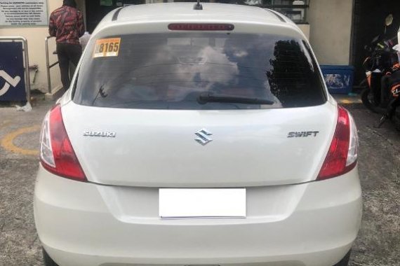 Sell White Suzuki Swift in Quezon City