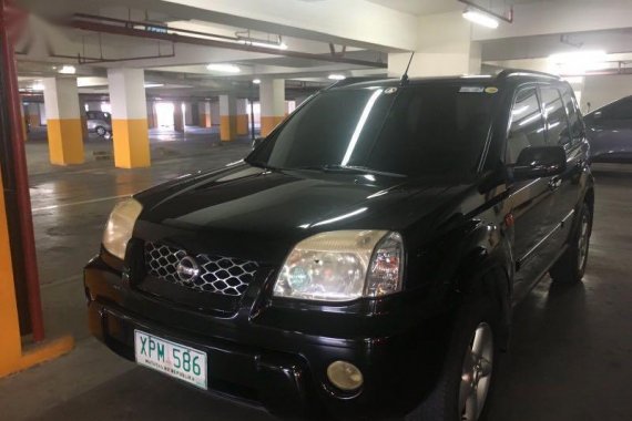 Selling Black Nissan X-Trail in Quezon City