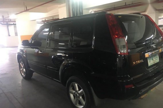 Selling Black Nissan X-Trail in Quezon City