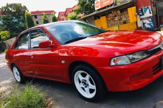 Red Mitsubishi Lancer for sale in Quezon City