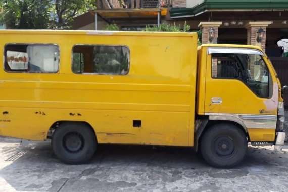 Sell Yellow Isuzu Elf in Parañaque