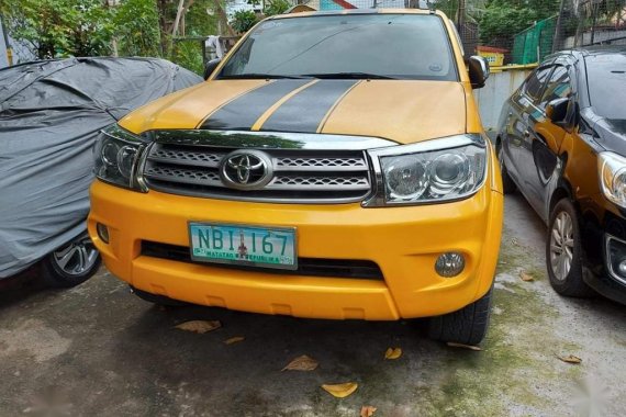 Yellow Toyota Fortuner 2009 for sale in Quezon City