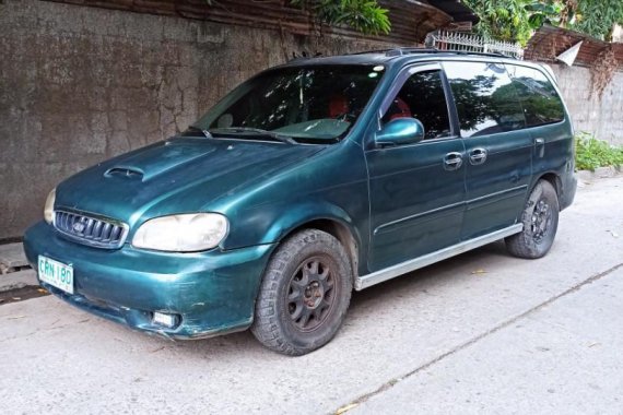 Blue Kia Carnival for sale in Las Piñas