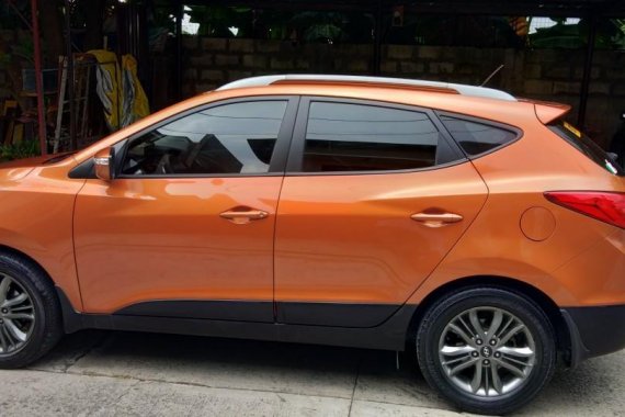 Sell Orange Hyundai Tucson in Manila
