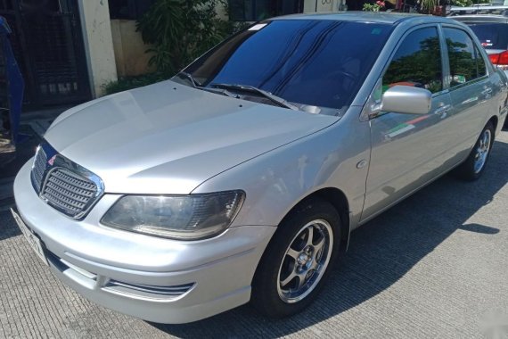 Sell Pearl White Mitsubishi Lancer in Quezon City