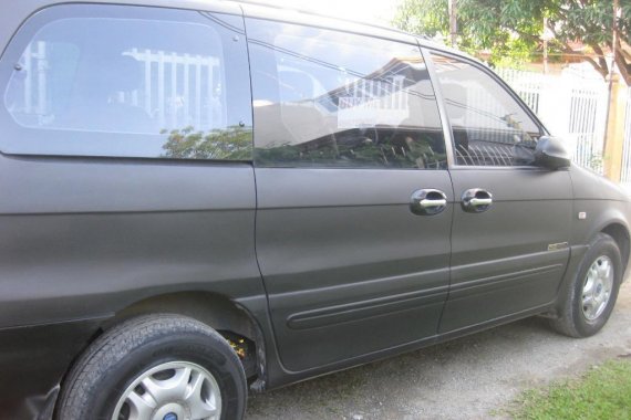 Sell Black Kia Carnival in Iligan