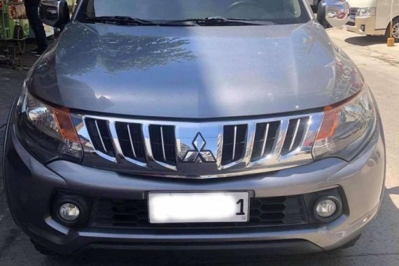 Pearl White Mitsubishi Strada for sale in Manila