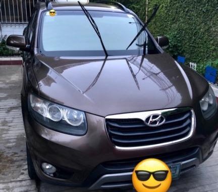Brown Hyundai Santa Fe 2012 for sale in Manila