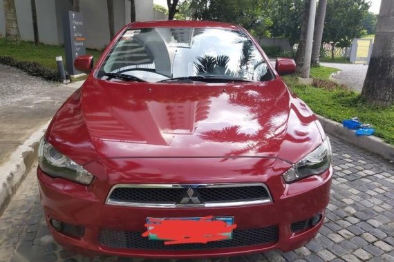 Red Mitsubishi Lancer 2013 for sale in Quezon City