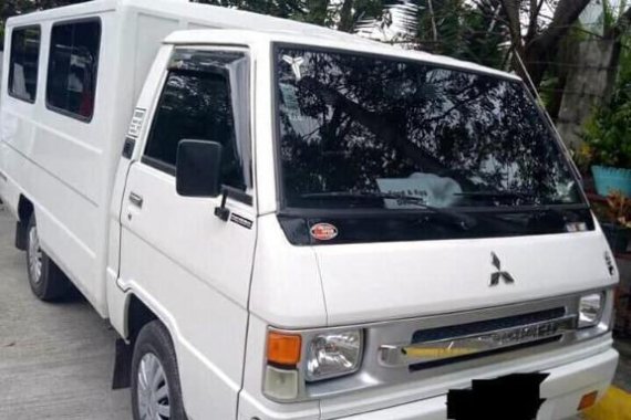 Pearl White Mitsubishi L300 2013 for sale in Quezon City