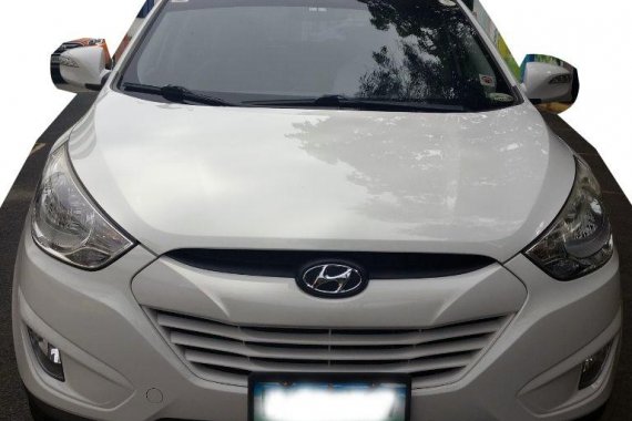 Selling White Hyundai Tucson 2013 SUV at 33051 km in Manila